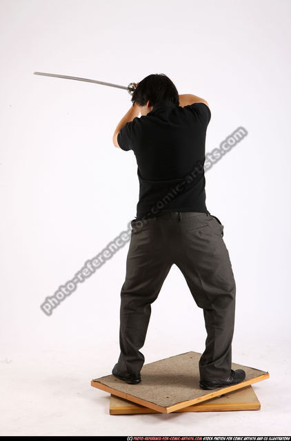 Man Adult Average Fighting with sword Standing poses Casual Asian
