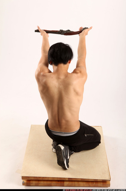 Man Young Athletic Holding Kneeling poses Pants Asian