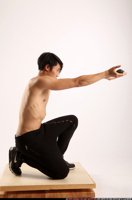 Man Young Athletic Holding Kneeling poses Pants Asian