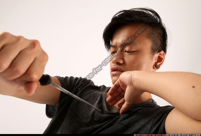 13400 Man Holding Knife Stock Photos Pictures  RoyaltyFree Images   iStock  Man holding knife behind back Man holding knife and fork