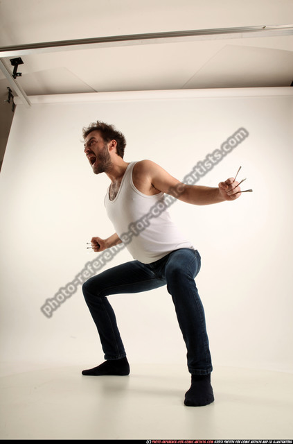 Man Adult Average White Fist fight Kneeling poses Casual