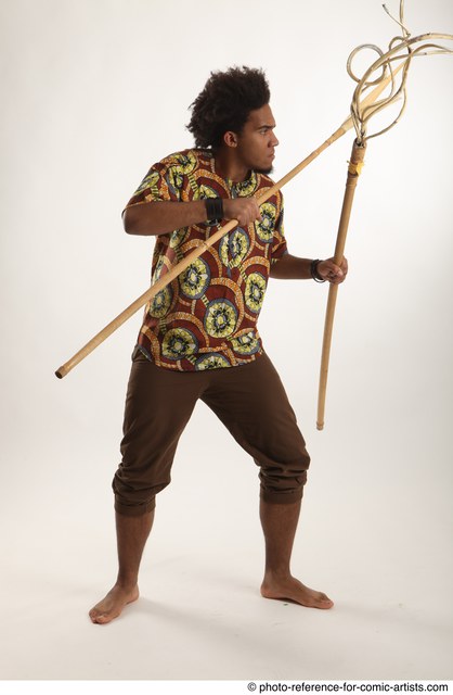 Man Adult Average Black Fighting with spear Standing poses Coat