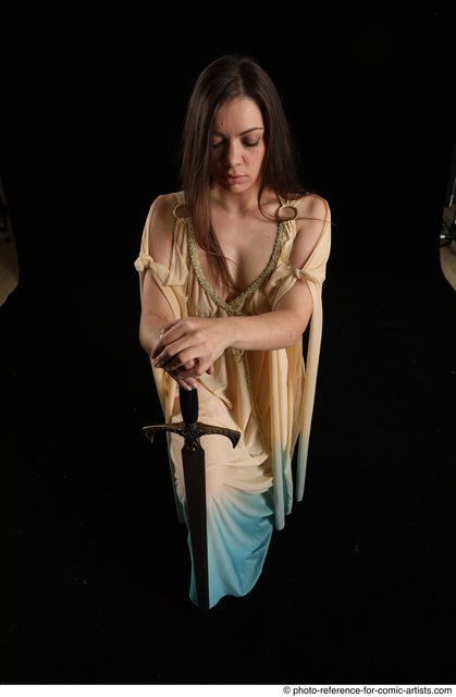 Woman Adult Average White Fighting with sword Kneeling poses Casual