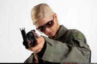 close-up-army-aiming-ak-female