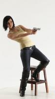 natalie-leaning-shooting-pistol