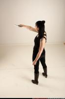 2017 05 CLAUDIA STANDING AIMING PISTOL 03 A