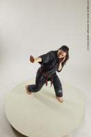 FIGHTING YOUNG WOMAN IN KIMONO 15A