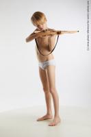 STANDING YOUNG BOY WITH CROSSBOW NOVEL 03