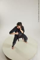 FIGHTING YOUNG WOMAN IN KIMONO 03A